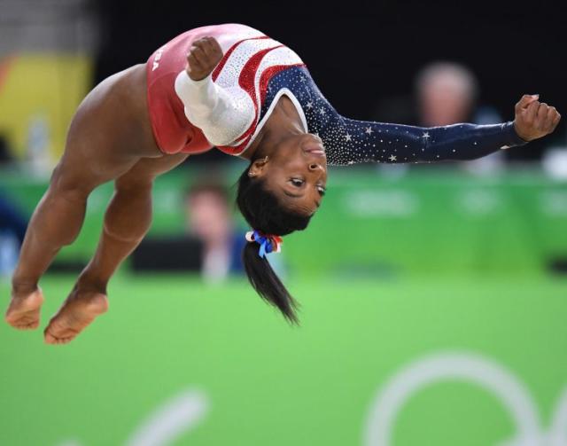 8 Gymnastics Moves Named After Simone Biles: A Visual Guide